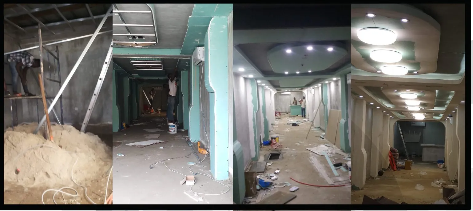 Plateau en cours de travaux : ossatures de faux-plafond, cloisons non finies, sol brut
